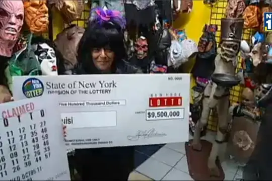 Gina Ruisi with her oversize check